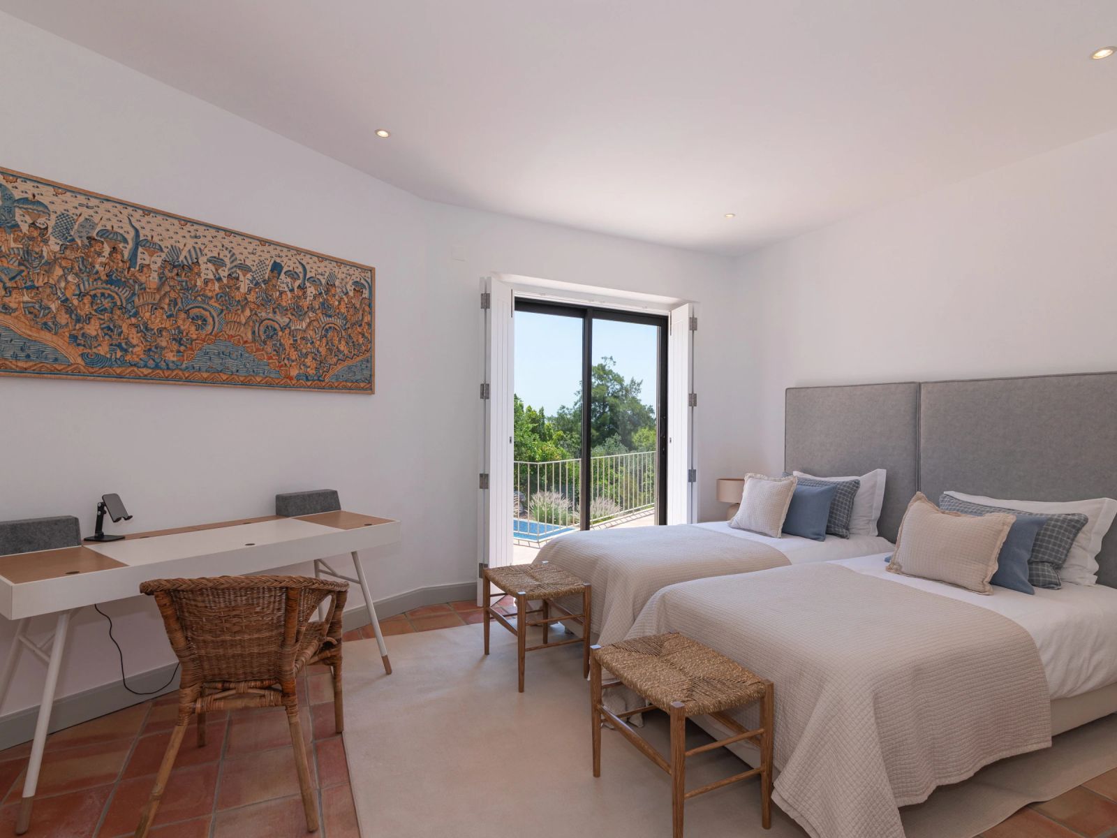 A twin bedroom at the villa